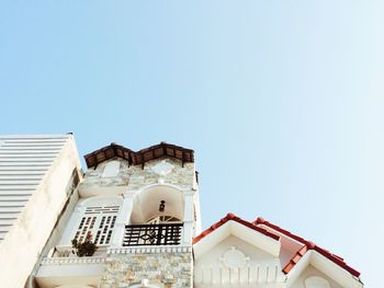 Low angle view of buildings against clear sky