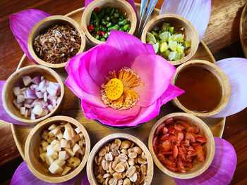 High angle view of purple flowers in bowl on table