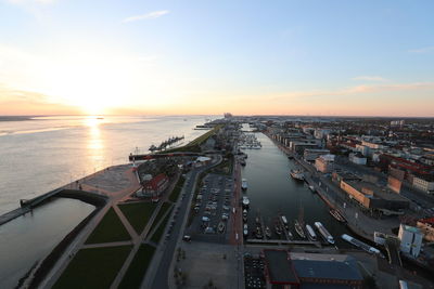 High angle view of city at sunset