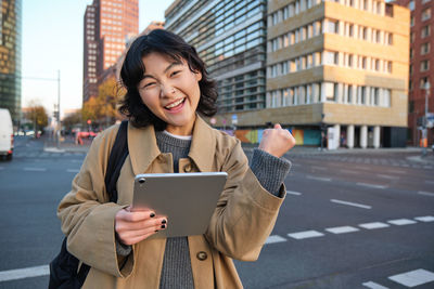 Young woman using mobile phone