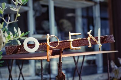 Close-up of open sign