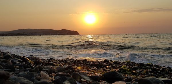 Scenic view of sea during sunset