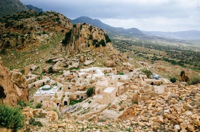 High angle view of townscape against mountain