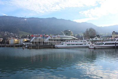 Calm sea with buildings in background