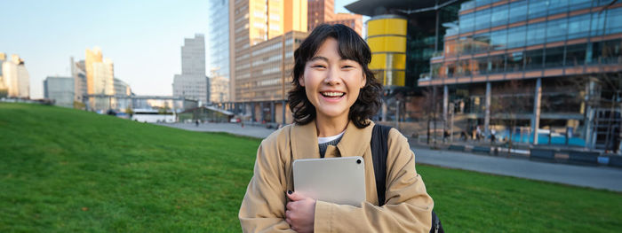 Young woman using mobile phone