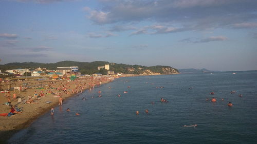 High angle view of tourists on beach