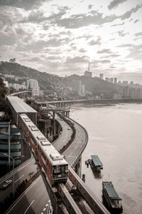 High angle view of city at riverbank