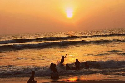 Scenic view of sea at sunset