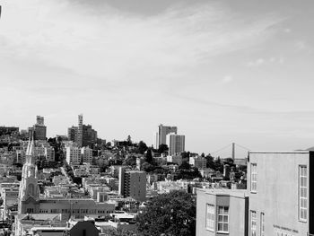 Modern buildings in city against sky