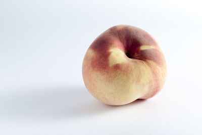Close-up of apple against white background