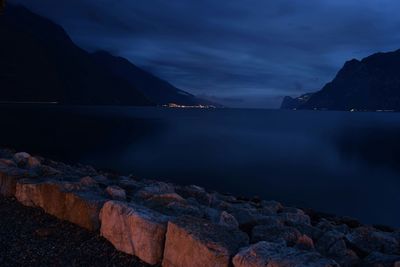 Scenic view of mountains against cloudy sky