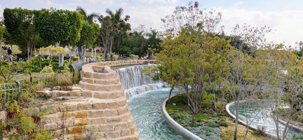 Panoramic view of swimming pool against sky