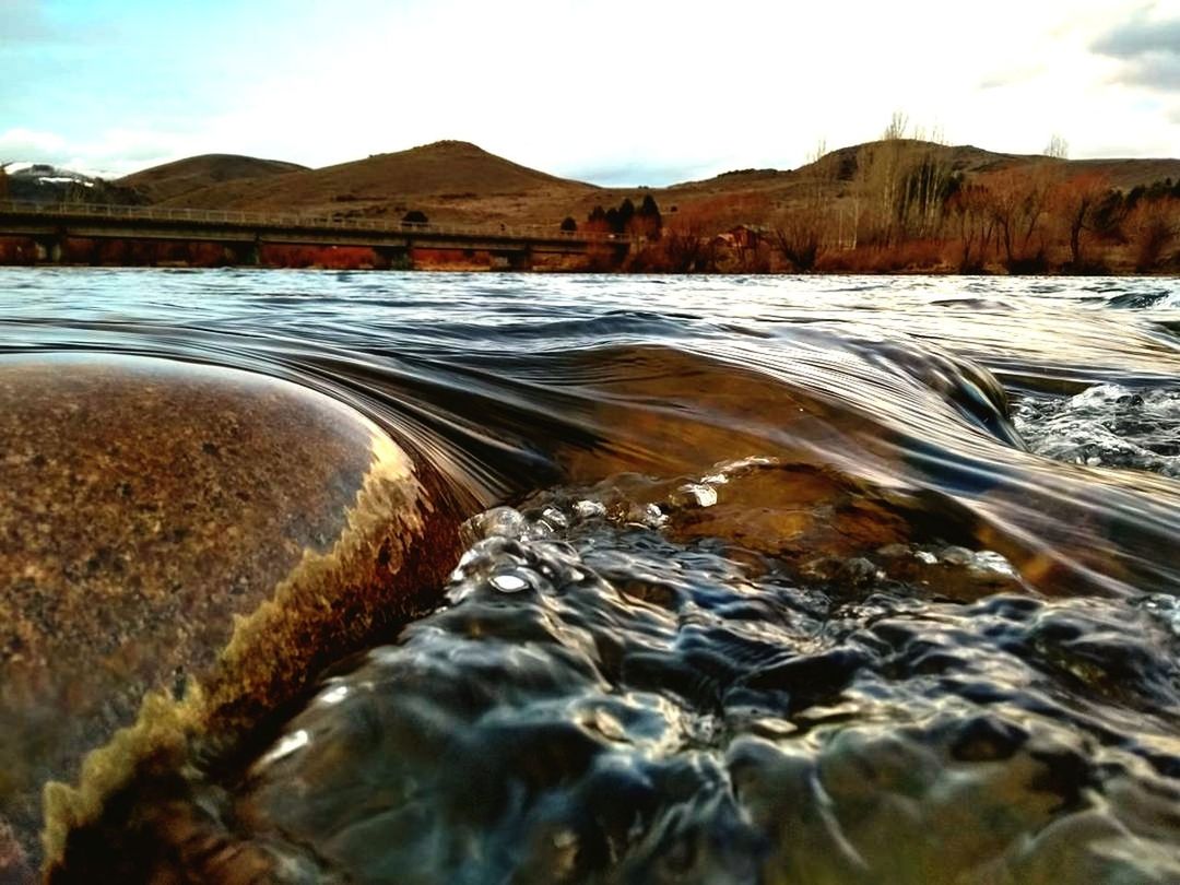 nature, water, beauty in nature, scenics, outdoors, tranquil scene, tranquility, no people, river, day, motion, sky, mountain