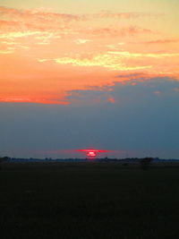 Scenic view of silhouette landscape against sky during sunset