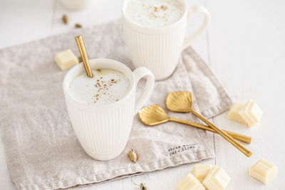 High angle view of coffee cup on table