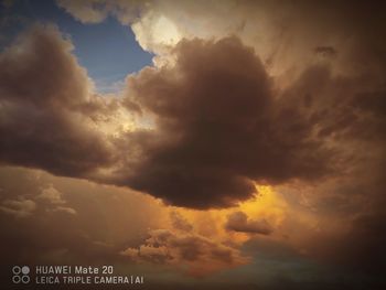 Low angle view of cloudy sky during sunset