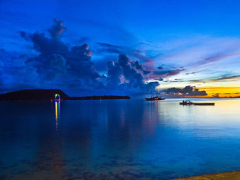 Scenic view of sea against dramatic sky