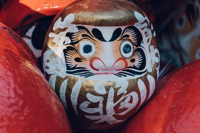 The daruma is a traditional japanese doll, a symbol of perseverance and luck.