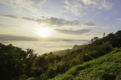 Scenic view of landscape against sky during sunset