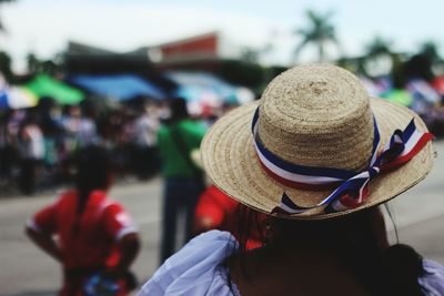 Rear view of woman wearing hat