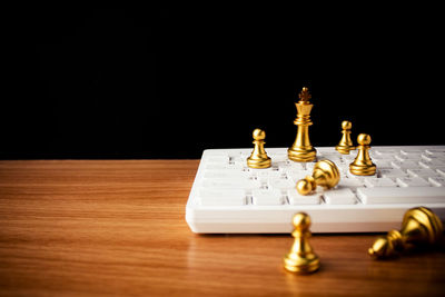 High angle view of chess pieces on table