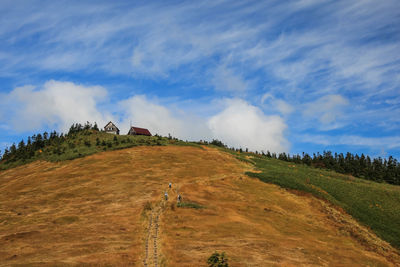 Scenic view of land against sky