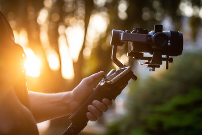 Close-up of hand holding camera