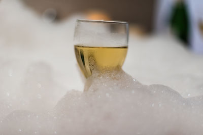 Close-up of beer in glass on table