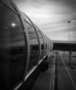 Train at railroad station against sky