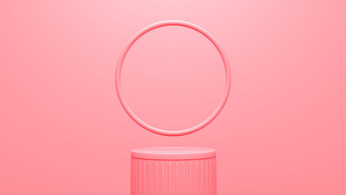 Close-up of electric light against pink background