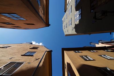 Low angle view of building against blue sky