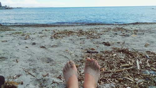 Low section of person on beach