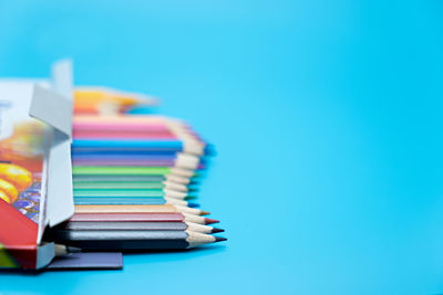 Close-up of colored pencils on table