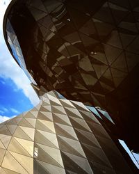 Low angle view of modern building against sky