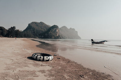 Sea and beaches with fishing boats in chumphon province of thailand on days without tourists