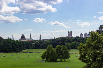 Trees in park against sky