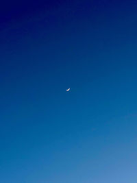 Low angle view of moon in sky