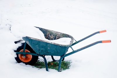 Umbrella on snow covered land