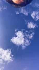 Low angle view of blue sky on sunny day