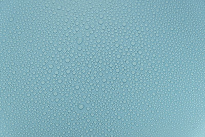 Full frame shot of wet glass