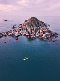 Aerial view of sup surfer ,triozerye, primorsky region, russia