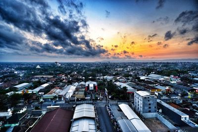 High angle view of buildings against sky during sunset