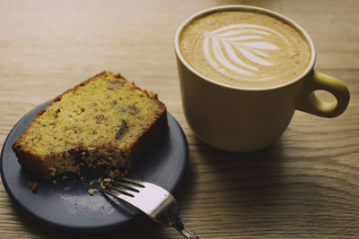 High angle view of cappuccino on table
