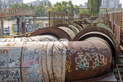 Graffiti on old metal bridge