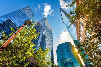 Low angle view of modern buildings against sky