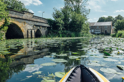 View of canal with buildings in background