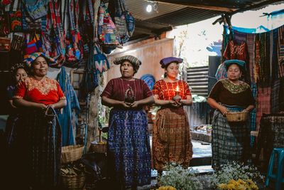 High angle view of people standing in market