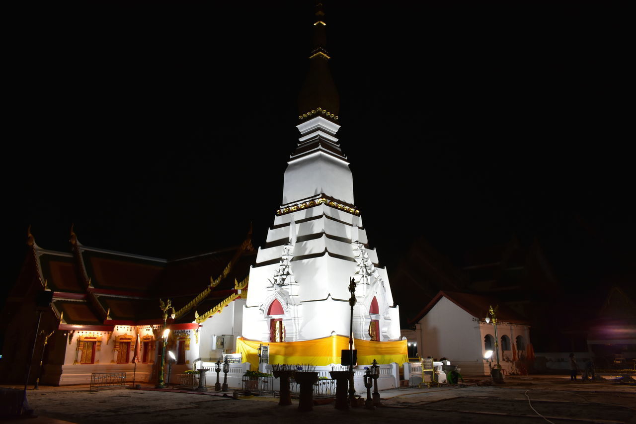 VIEW OF ILLUMINATED BUILDING AT NIGHT