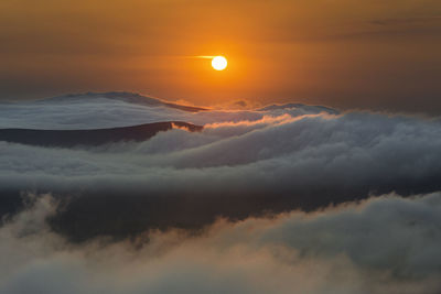 Low angle view of cloudscape against sky during sunset