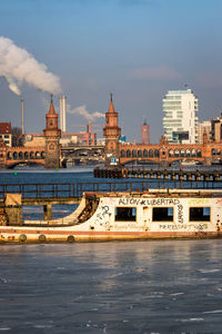 River by city against sky